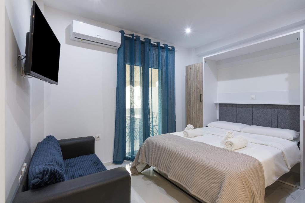 Postel nebo postele na pokoji v ubytování Modern Studio in Piraeus