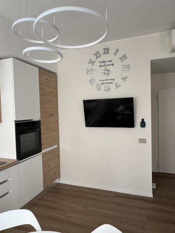 TV a/nebo společenská místnost v ubytování B&B IV Novembre