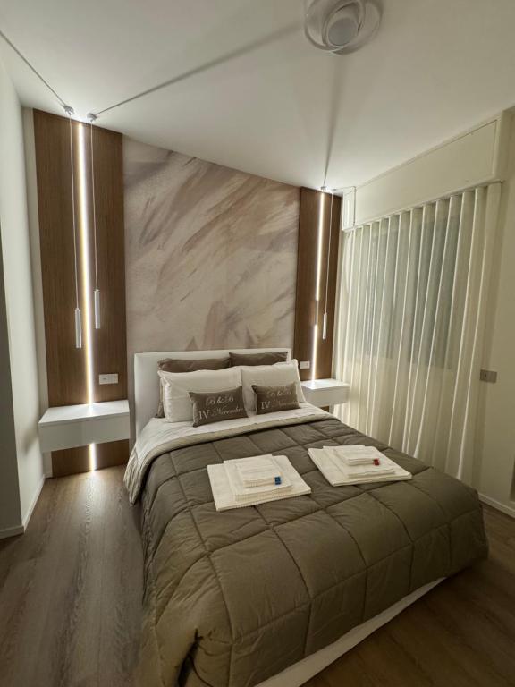 Postel nebo postele na pokoji v ubytování B&B IV Novembre