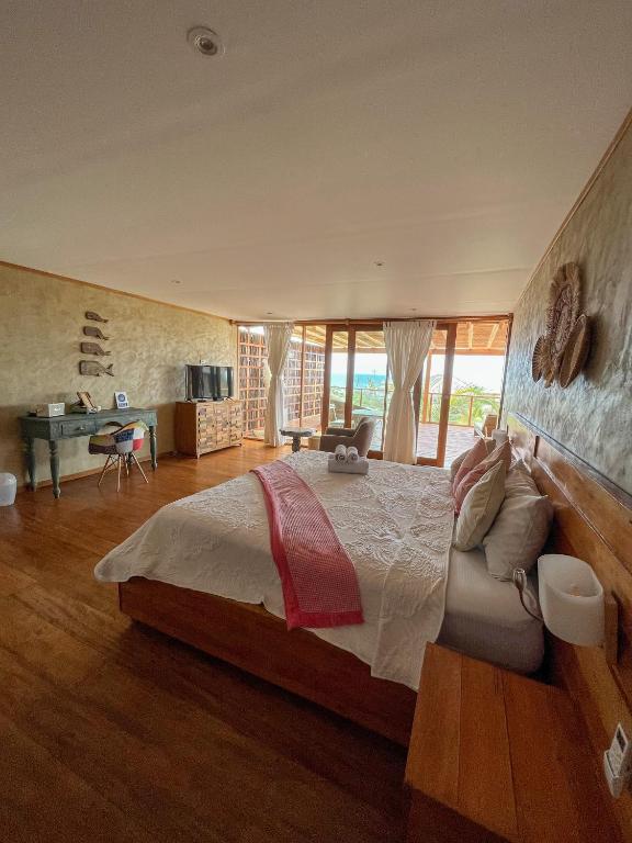 Postel nebo postele na pokoji v ubytování Casa Safran Vichayito