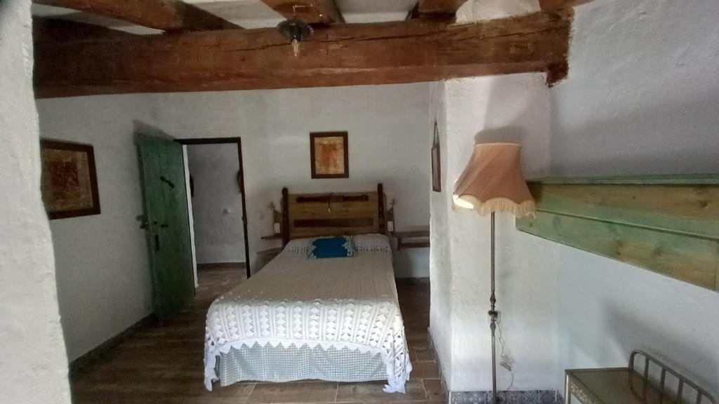 Postel nebo postele na pokoji v ubytování Mirador de las Tejadas