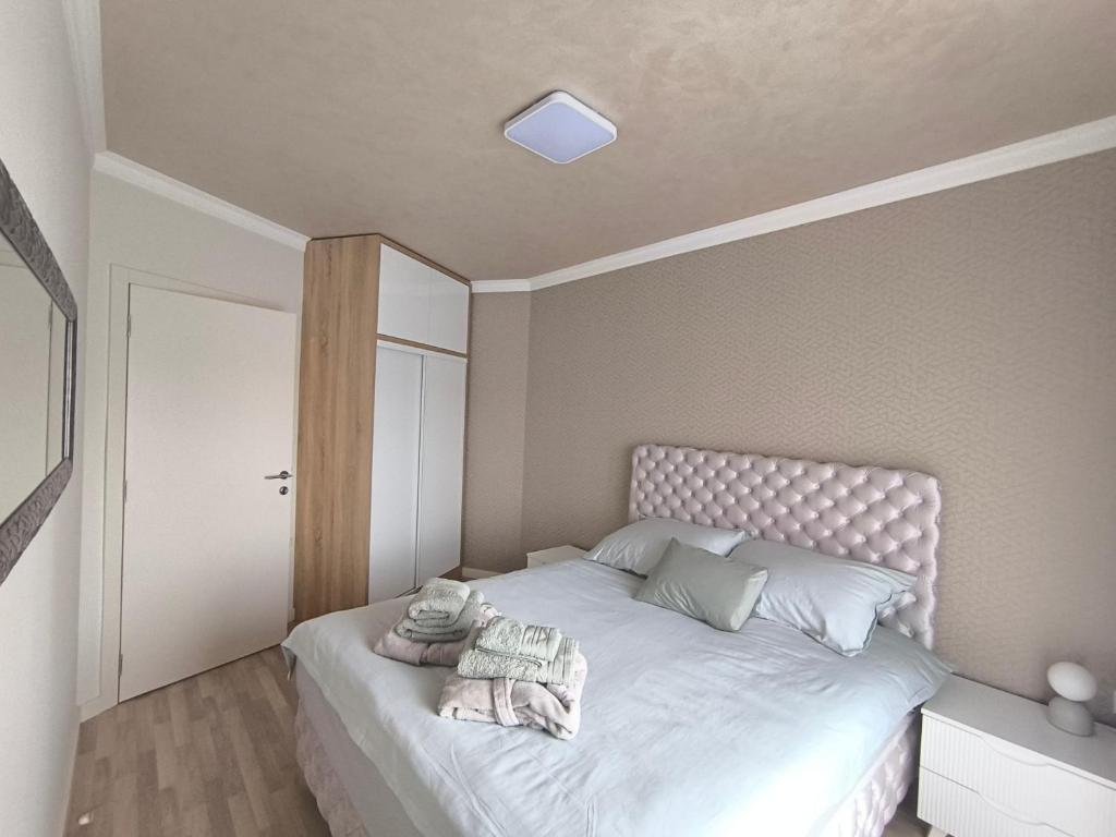 Postel nebo postele na pokoji v ubytování Mina Lux