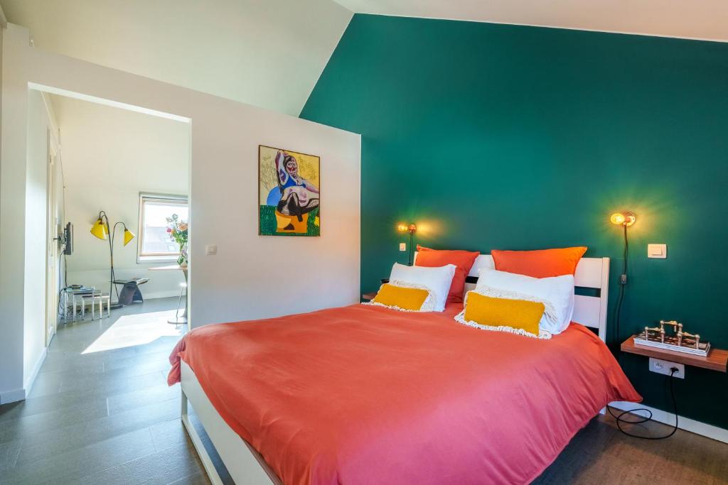 Postel nebo postele na pokoji v ubytování Guesthouse Gieterij