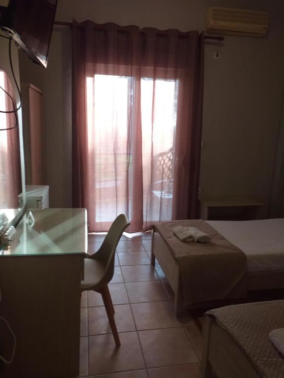 Кровать или кровати в номере Hotel Isidora