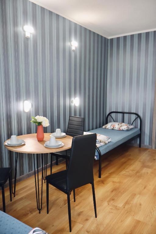 Postel nebo postele na pokoji v ubytování VIP hotel