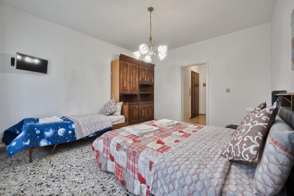 Postel nebo postele na pokoji v ubytování Urban Apt Neighbour Venice
