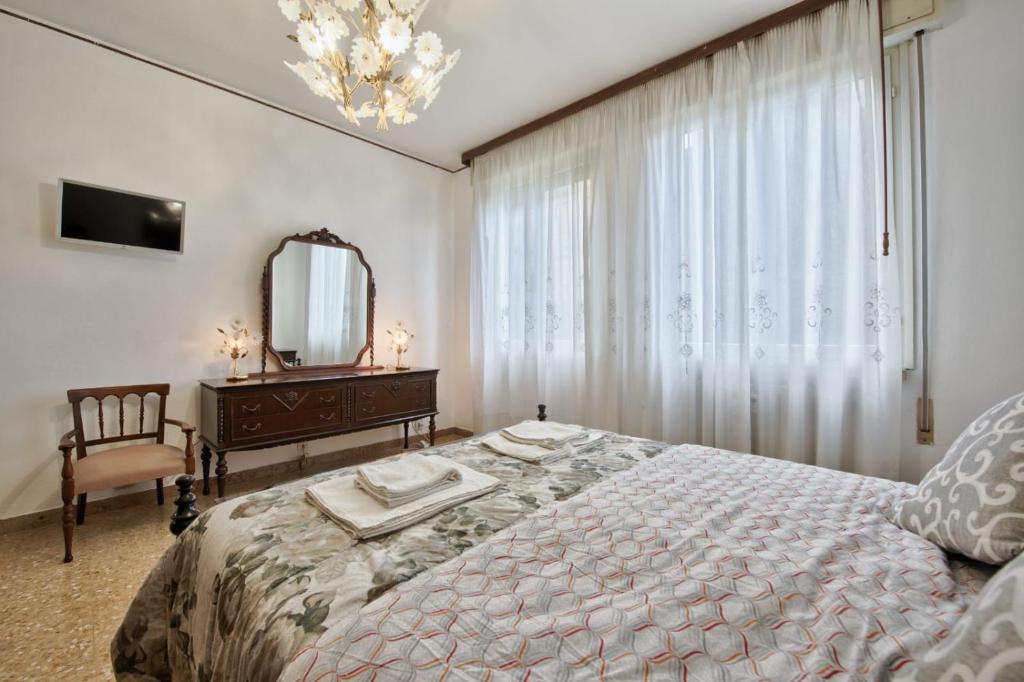 Postel nebo postele na pokoji v ubytování Urban Apt Neighbour Venice