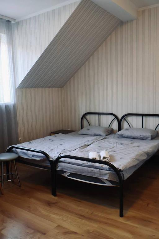 Postel nebo postele na pokoji v ubytování VIP hotel