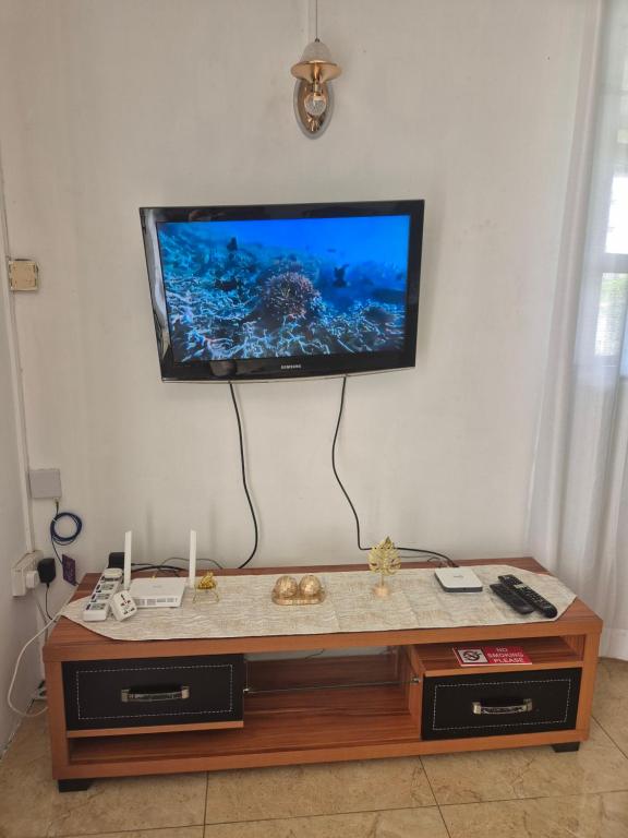 TV a/nebo společenská místnost v ubytování Villa Sunset Mauritius
