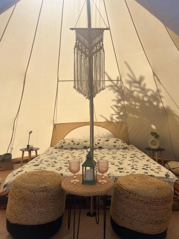 Postel nebo postele na pokoji v ubytování Glamping Rusne