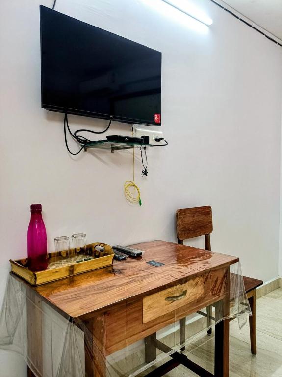 TV a/nebo společenská místnost v ubytování Aashrey Bed and Breakfast