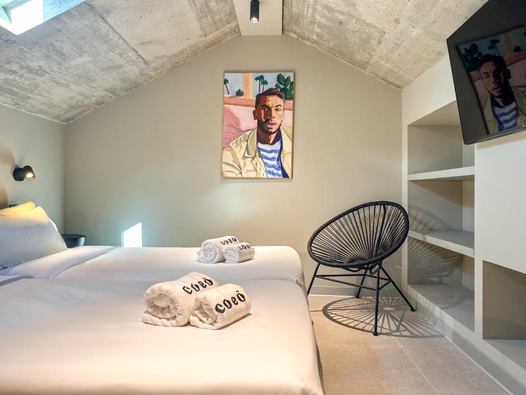 Postel nebo postele na pokoji v ubytování Coeo Hernan Ruiz Rooftop Pool Hostel