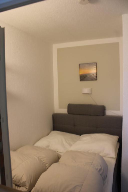 Postel nebo postele na pokoji v ubytování Ferienwohnung Sonnenschein mit großem Balkon