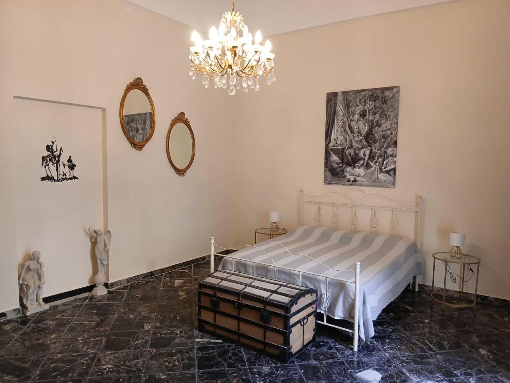 Postel nebo postele na pokoji v ubytování Palazzo delle favole