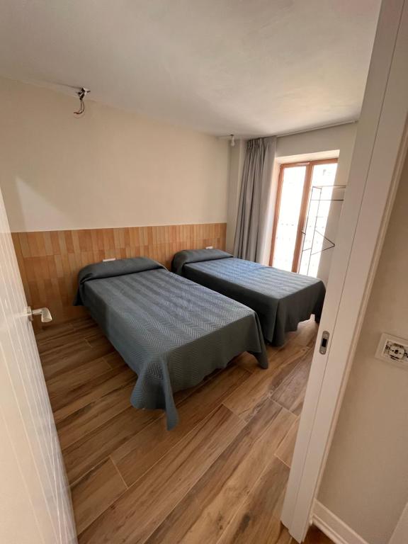 Postel nebo postele na pokoji v ubytování The Nest Masia Can Tiranasi Relájate y Disfruta Escapada con Encanto Cerca de Barcelona-