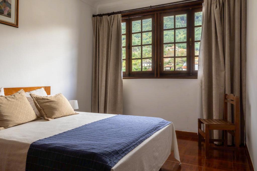 Postel nebo postele na pokoji v ubytování Serrana Gerês Inn