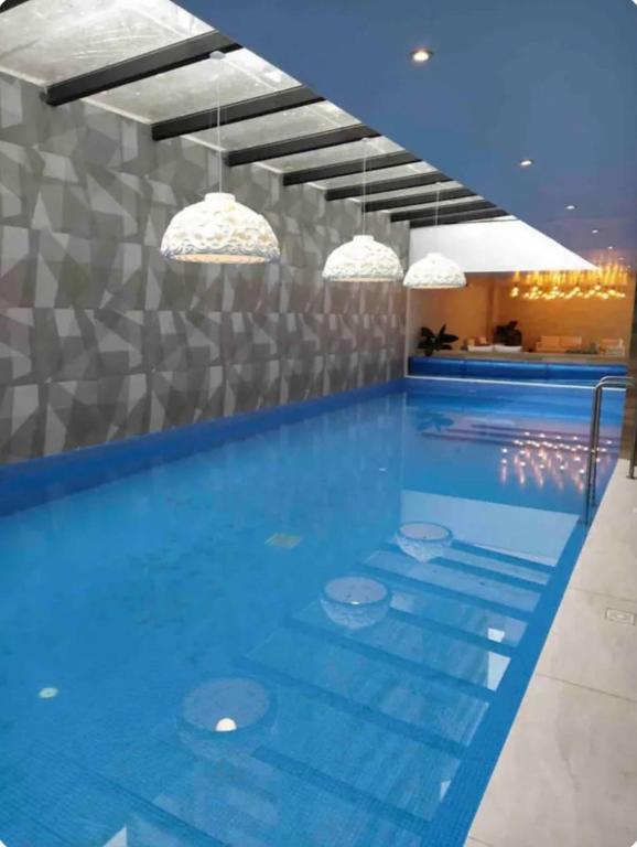 Bazén v ubytování Lovely View Studio Building Heated Pool Gym Turco WIFI nebo v jeho okolí