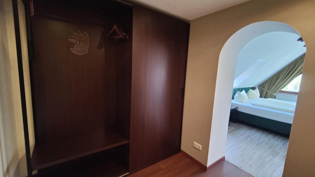 Postel nebo postele na pokoji v ubytování Hotel Stettiner Hof