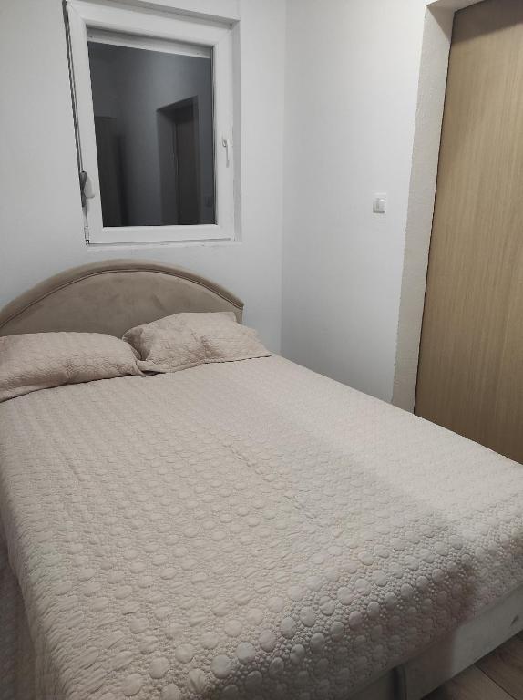 Postel nebo postele na pokoji v ubytování Tanla