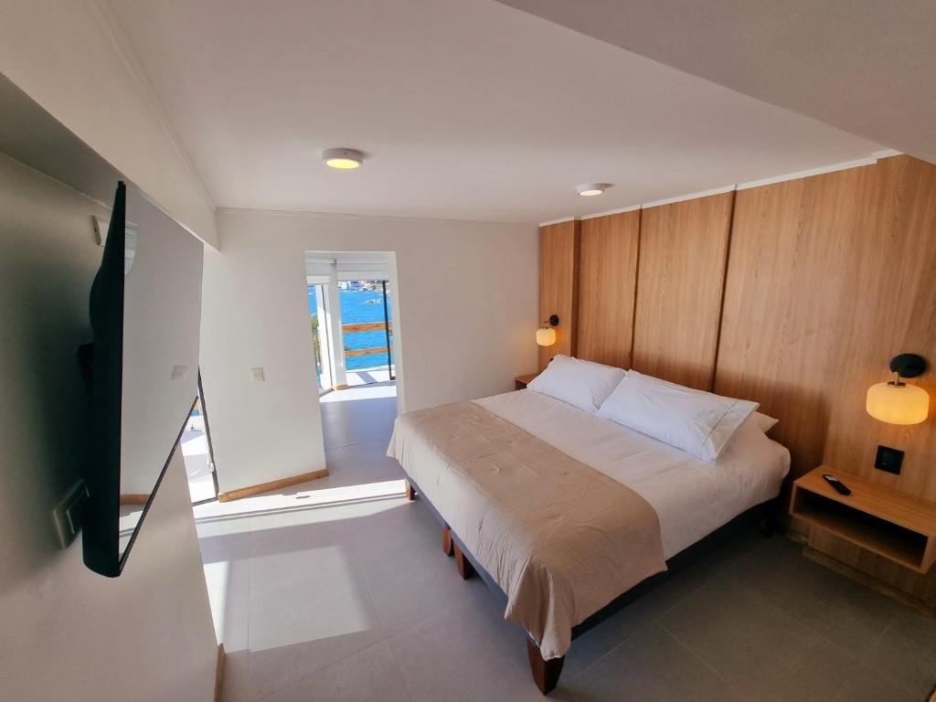 Postel nebo postele na pokoji v ubytování Maré Hotel Boutique
