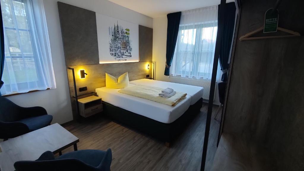 Postel nebo postele na pokoji v ubytování Hotel Stettiner Hof