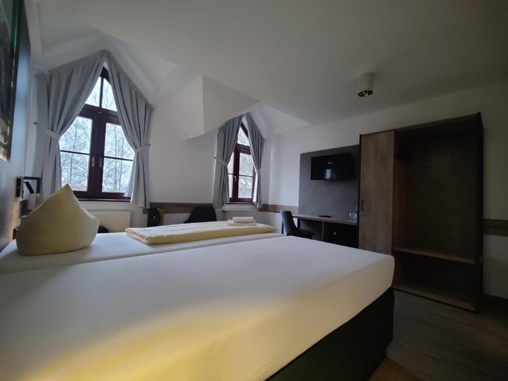 Postel nebo postele na pokoji v ubytování Hotel Stettiner Hof