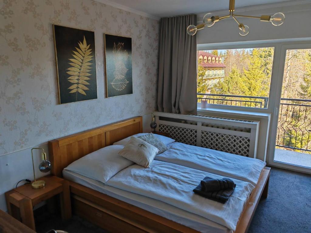 Postel nebo postele na pokoji v ubytování Apartmán Stella, Vysoké Tatry