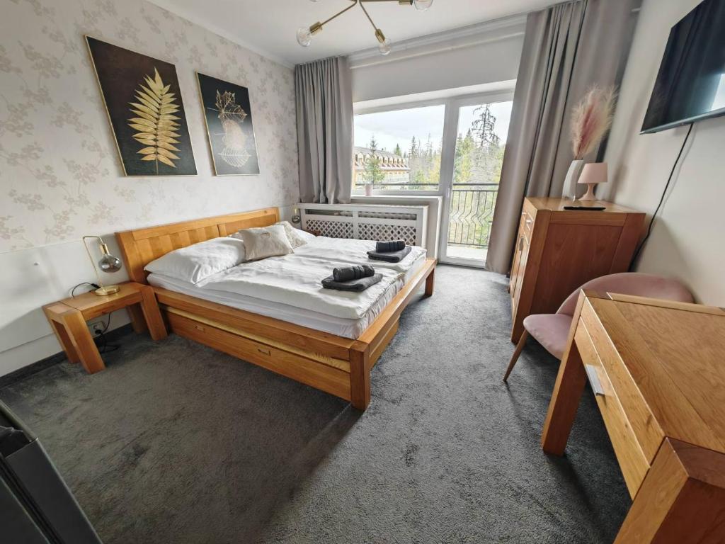Postel nebo postele na pokoji v ubytování Apartmán Stella, Vysoké Tatry