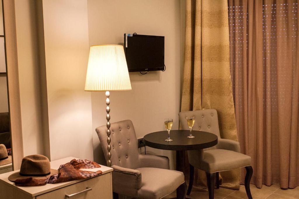 TV a/nebo společenská místnost v ubytování Hotel Aheron