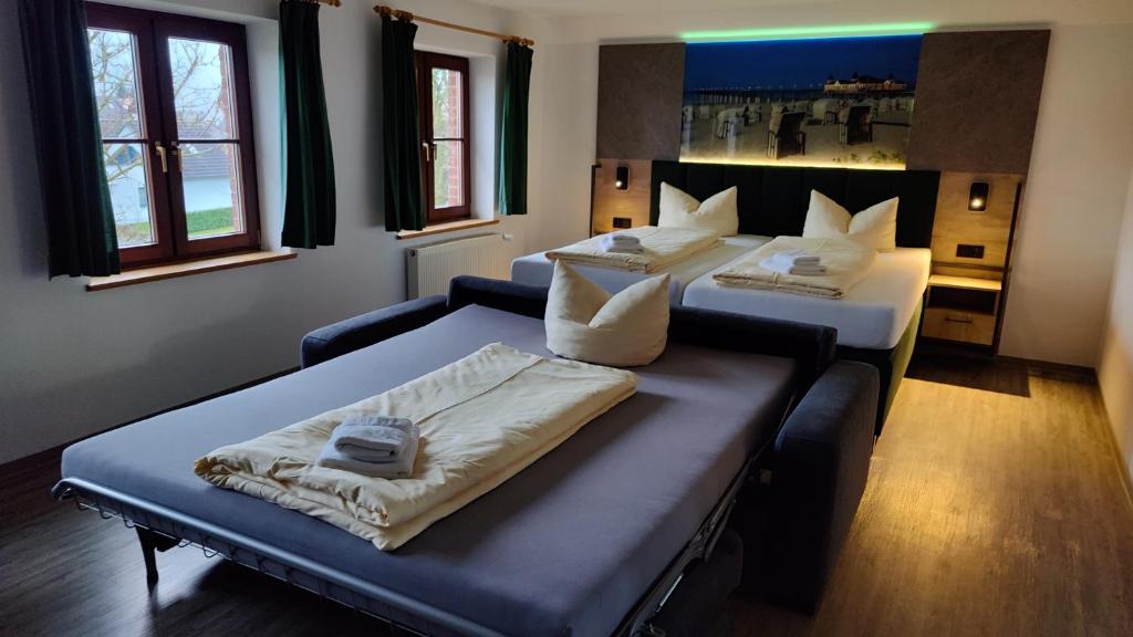 Postel nebo postele na pokoji v ubytování Hotel Stettiner Hof