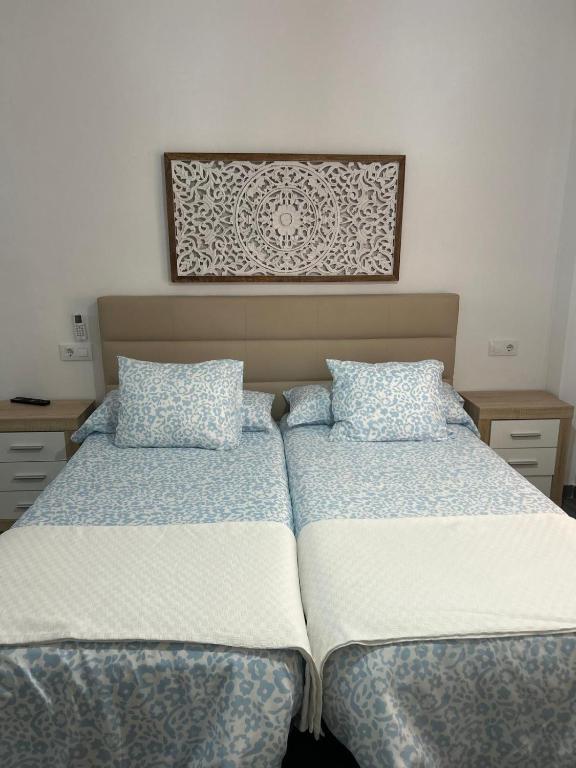 Posteľ alebo postele v izbe v ubytovaní Apartamento en Urbanización Residencial - Roble, 5