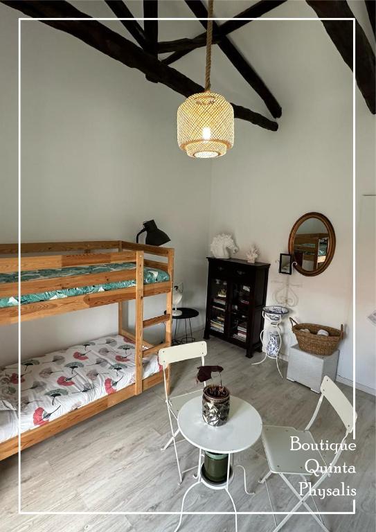 Postel nebo postele na pokoji v ubytování Boutique Quinta Physalis