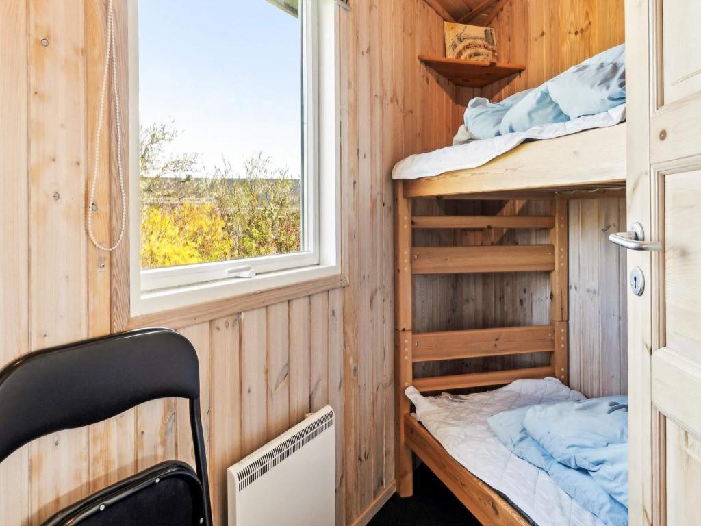 Postel nebo postele na pokoji v ubytování 4 person holiday home in Vinderup-By Traum