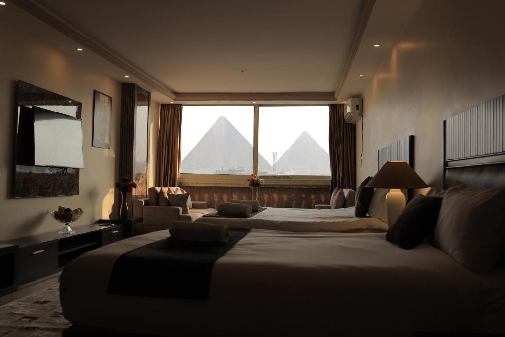 Postelja oz. postelje v sobi nastanitve The Muse Pyramids Lodge