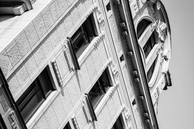 a black and white photo of a building with windows at Apartment Belveder Brno in Brno