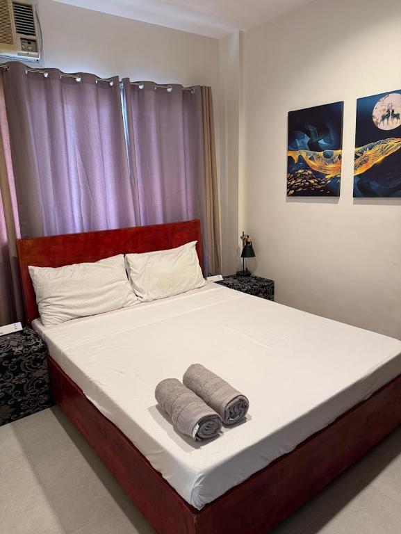 Postel nebo postele na pokoji v ubytování Lakandiwa Tourist Inn
