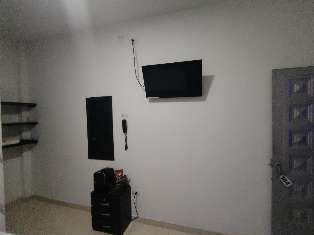 TV a/nebo společenská místnost v ubytování Hotel Palmari