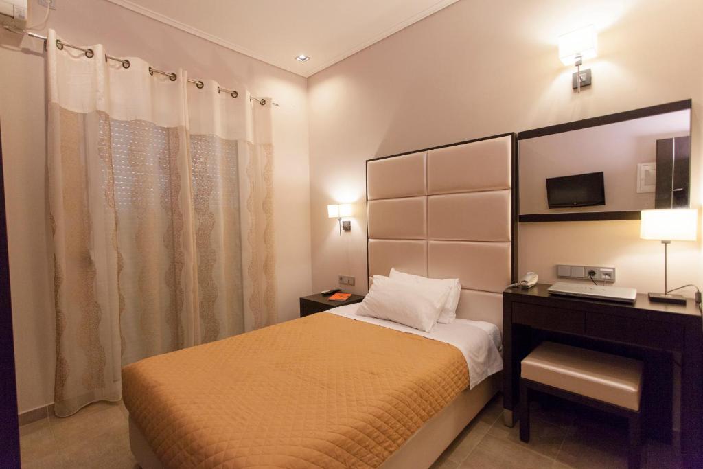 Postel nebo postele na pokoji v ubytování Hotel Aheron