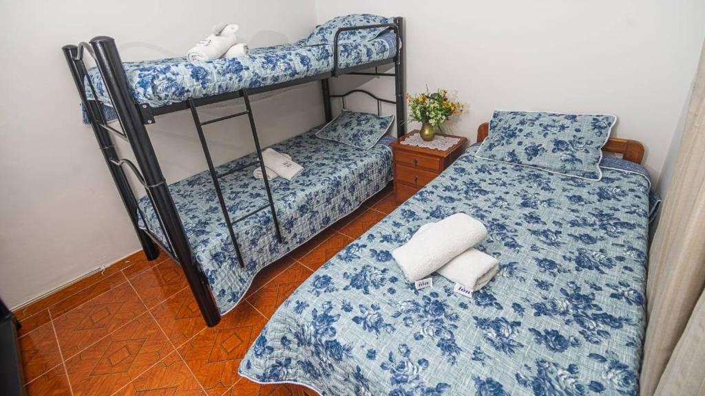 Postel nebo postele na pokoji v ubytování Vivienda Turística "El Coronel"