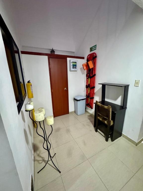 TV a/nebo společenská místnost v ubytování Hotel Tucan Pereira