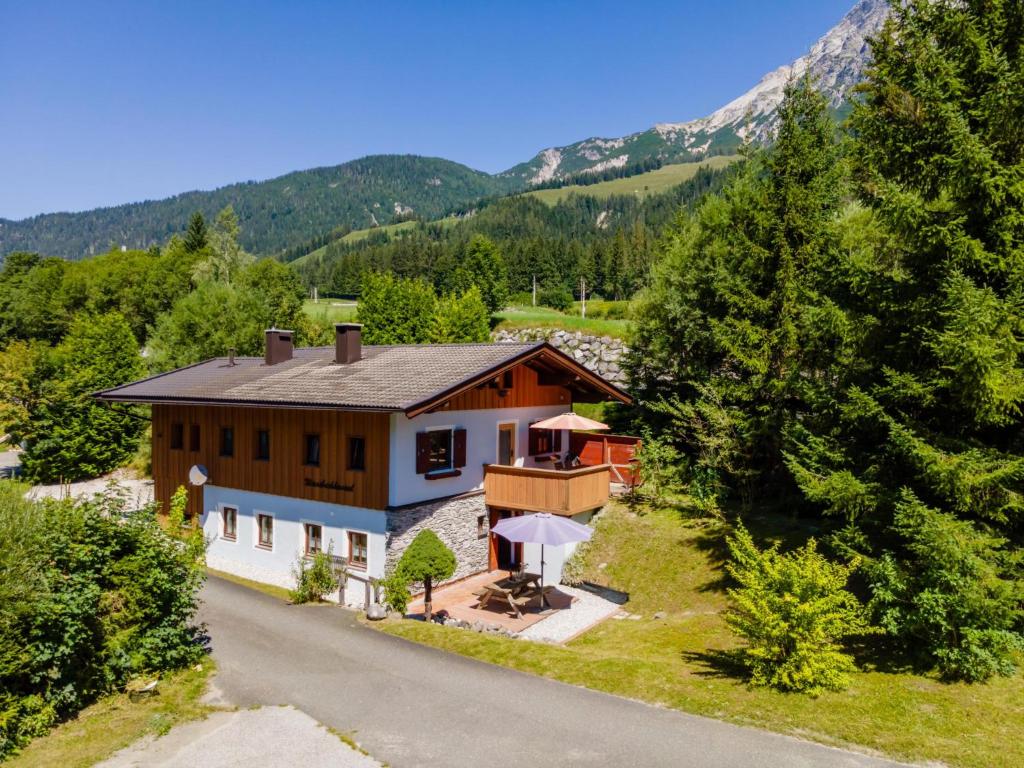 an aerial view of a house in the mountains at Haus Weissbach in Leogang