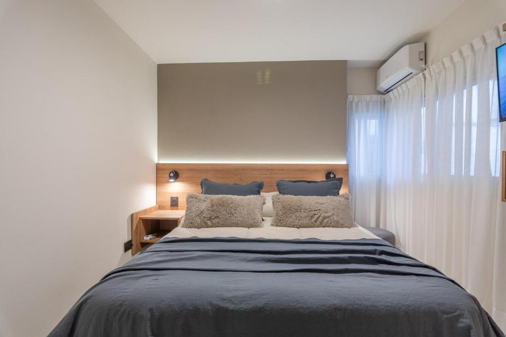 Postel nebo postele na pokoji v ubytování Nova Apartament