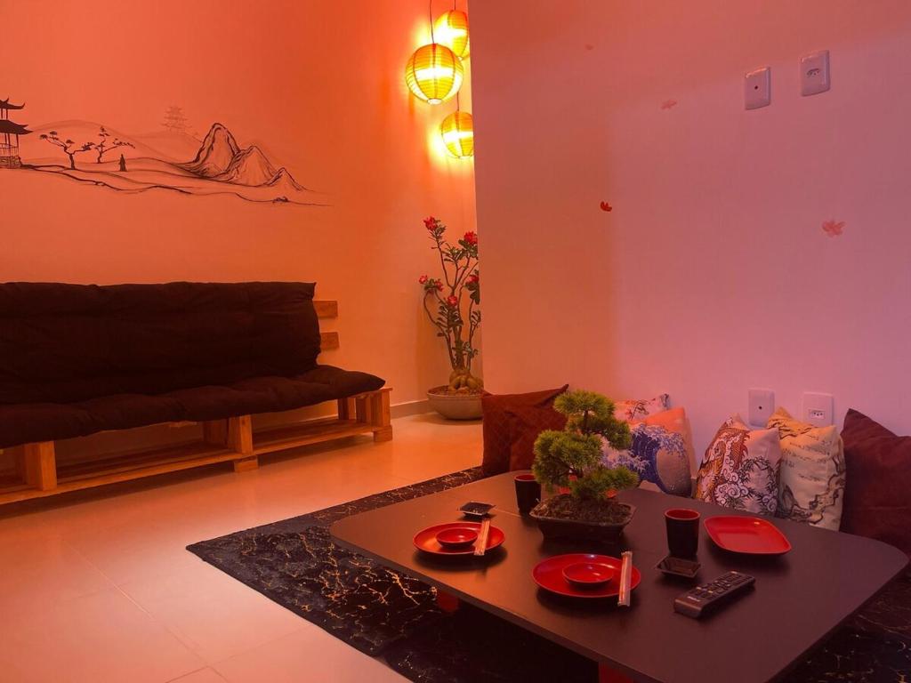Χώρος καθιστικού στο Flat YinYang - Temática Japonesa e Conforto Climatizado