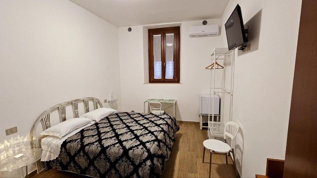 Postel nebo postele na pokoji v ubytování Le Corti