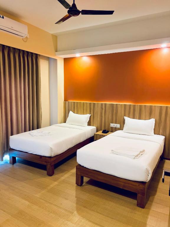 Katil atau katil-katil dalam bilik di Hotel Quest