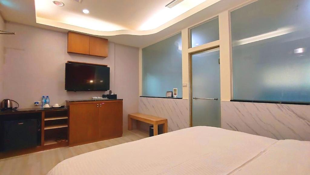 TV a/nebo společenská místnost v ubytování Jin Yong Quan Spa Hotspring Resort