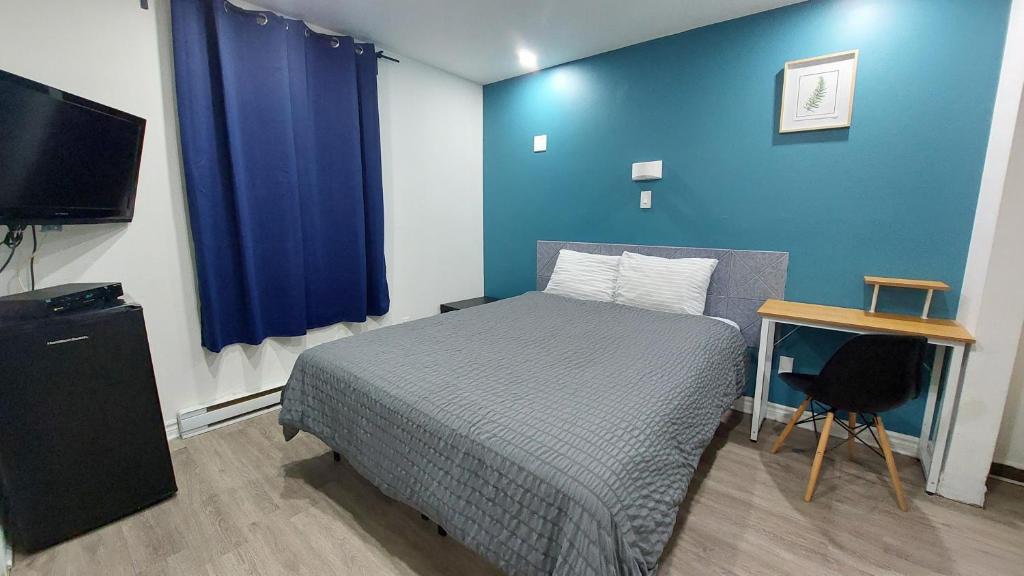 Postel nebo postele na pokoji v ubytování APD HOTEL