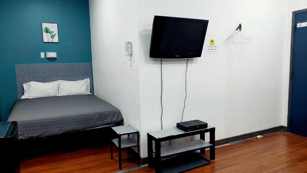 TV a/nebo společenská místnost v ubytování APD HOTEL