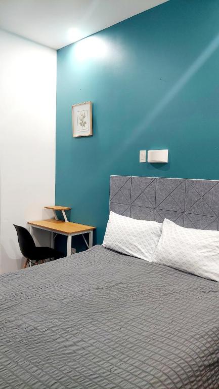 Postel nebo postele na pokoji v ubytování APD HOTEL