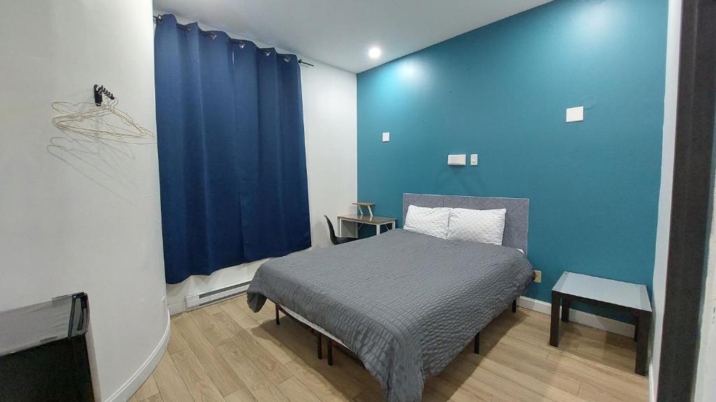 Postel nebo postele na pokoji v ubytování APD HOTEL